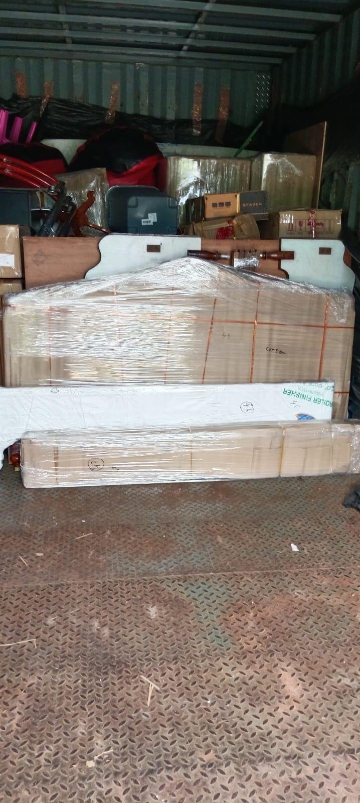 Team packing household items by Packers and Movers Rajahmundry